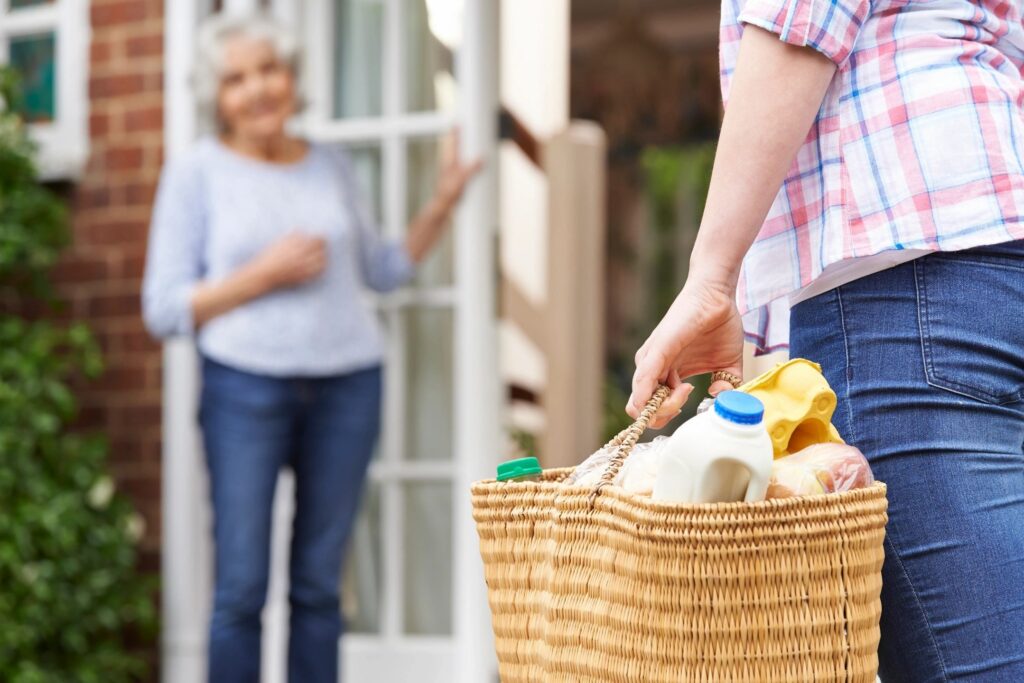 A man holding a grocery bag